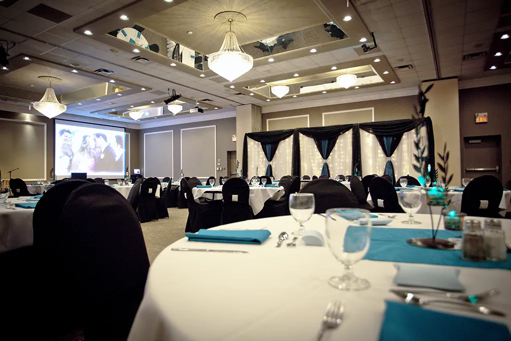 A photo of the campus ballroom decorated for a wedding.